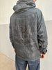 Back of Indian Larry dark camouflage windbreaker with winged graphic and Brooklyn NY lettering